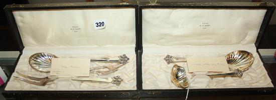 Two cased silver (830 standard) serving sets, with pierced finials & a set of 12 similar coffee spoons, all by Magnus Aase, Norway